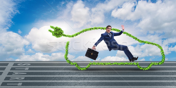 The businessman in green electric car concept Stock photo © Elnur