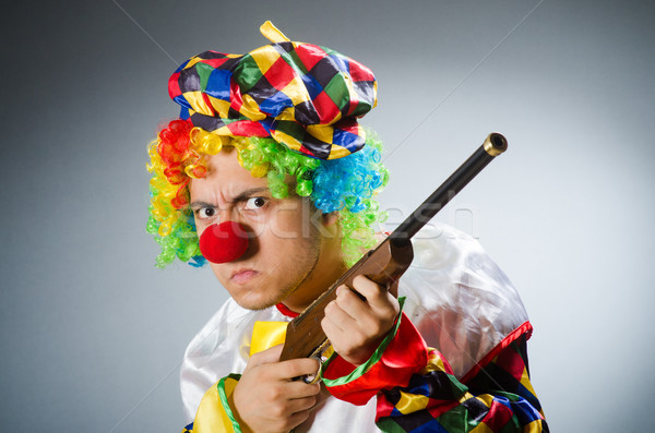 Stock photo: Funny clown in comical concept