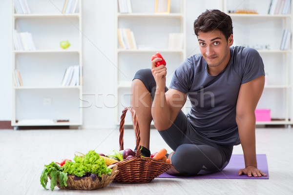 Man promoting the benefits of healthy eating and doing sports Stock photo © Elnur
