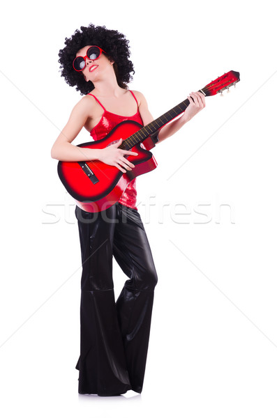 Stock photo: Young singer with afro cut and guitar