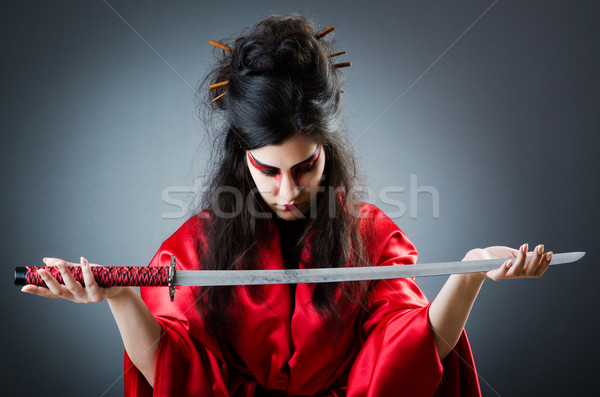 Vrouwelijke zwaard donkere studio vrouw sport Stockfoto © Elnur