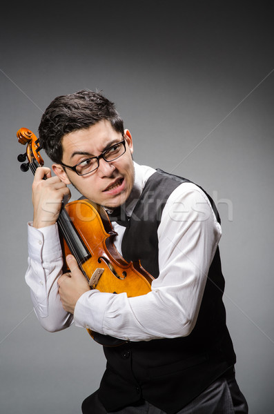 Drôle violon joueur homme sonores [[stock_photo]] © Elnur