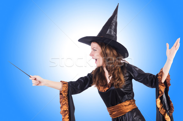 Witch with wand isolated on the white Stock photo © Elnur
