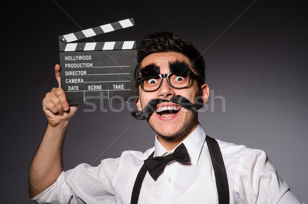 Jeune homme faux moustache isolé gris homme [[stock_photo]] © Elnur