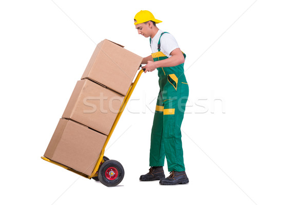Young man moving boxes with cart isolated on white Stock photo © Elnur