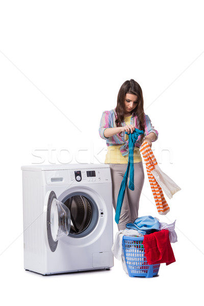 Woman tired after doing laundry isolated on white Stock photo © Elnur