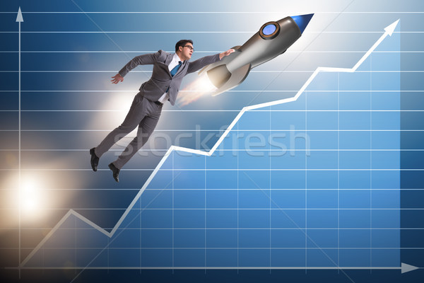 Businessman on rocket in trading concept Stock photo © Elnur