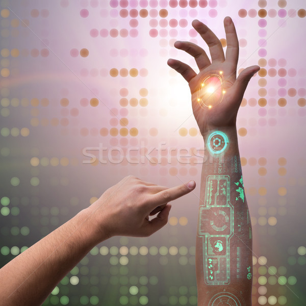 Stock photo: Human robotic hand in futuristic concept