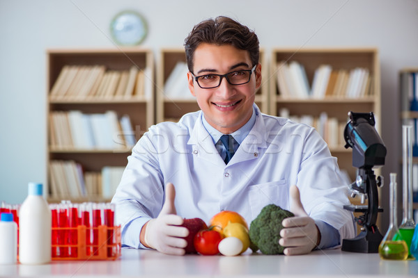 Man doctor checking the fruits and vegetables Stock photo © Elnur