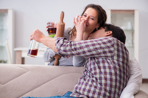 Domestic violence concept in a family argument with drunk alcoho Stock photo © Elnur