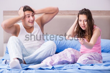 Family conflict with wife and husband in bed Stock photo © Elnur
