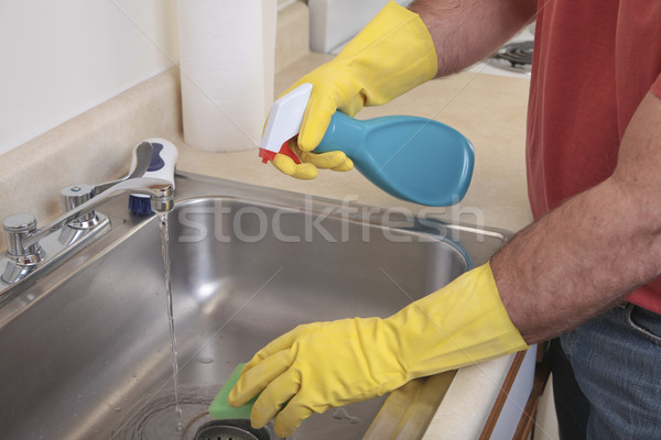 Man cleaning the sink Stock photo © elvinstar