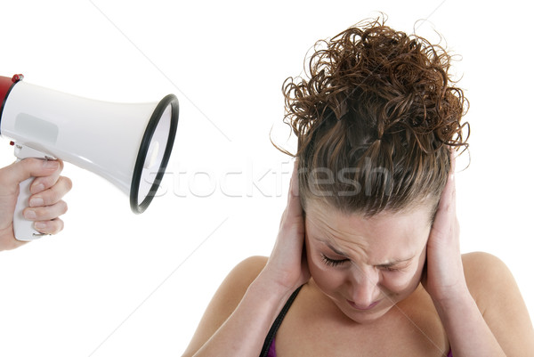 Woman yelled at by a megaphone Stock photo © elvinstar