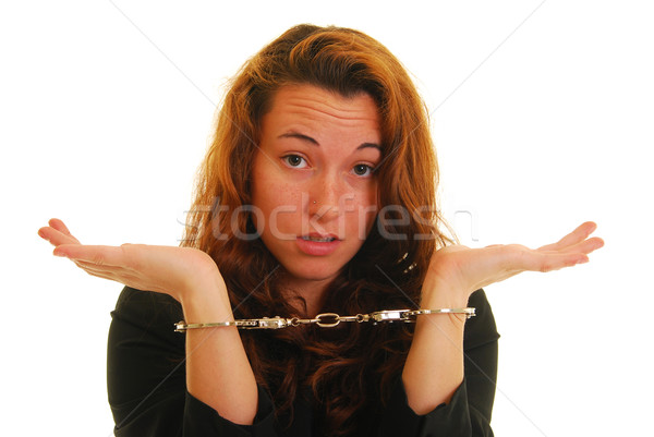 деловая женщина наручники привлекательный кавказский женщину костюм Сток-фото © elvinstar