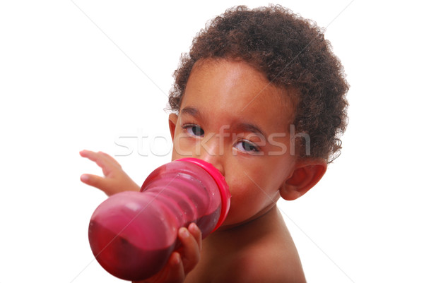 Multi-racial baby drinking Stock photo © elvinstar