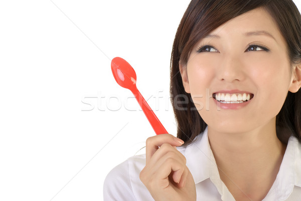 business woman holding tablespoon Stock photo © elwynn