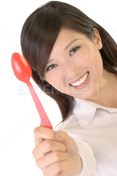 Business woman with tablespoon Stock photo © elwynn