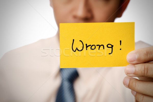 Errado palavras amarelo cartão mão Foto stock © elwynn