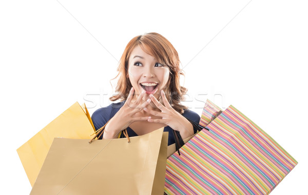 Cheerful shopping woman Stock photo © elwynn