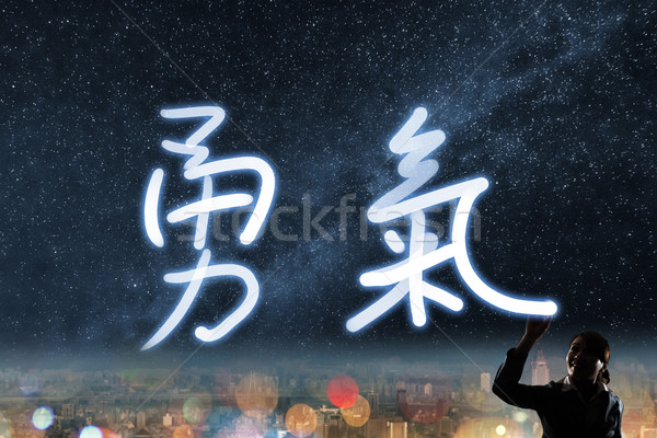 Moed silhouet asian zakenvrouw licht tekening Stockfoto © elwynn