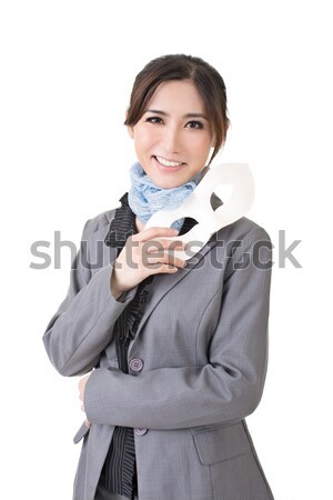 Asian business woman holding a mask Stock photo © elwynn