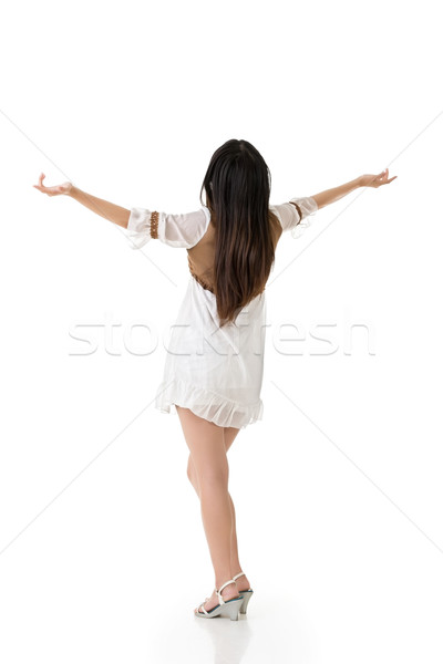 Beautiful asian woman stretch arms from back Stock photo © elwynn