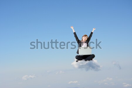 Nuvem empresário sentar-se equipe nublado céu Foto stock © elwynn