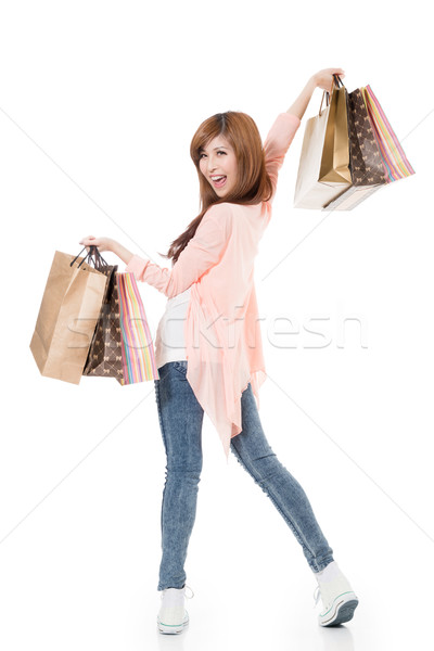 Derűs vásárlás nő ázsiai tart szatyrok Stock fotó © elwynn