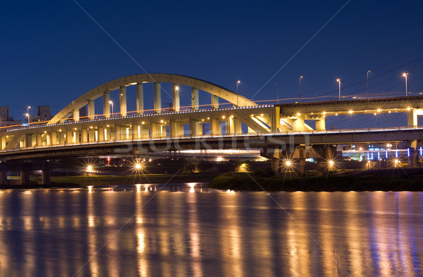 Moderne brug stad gouden reflectie rivier Stockfoto © elwynn