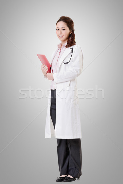 Friendly Asian doctor Stock photo © elwynn
