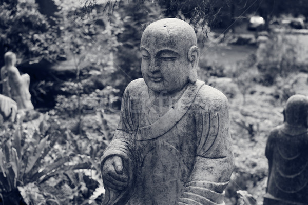 Ruined statue Ksitigarbha Bodhisattva  Stock photo © elwynn