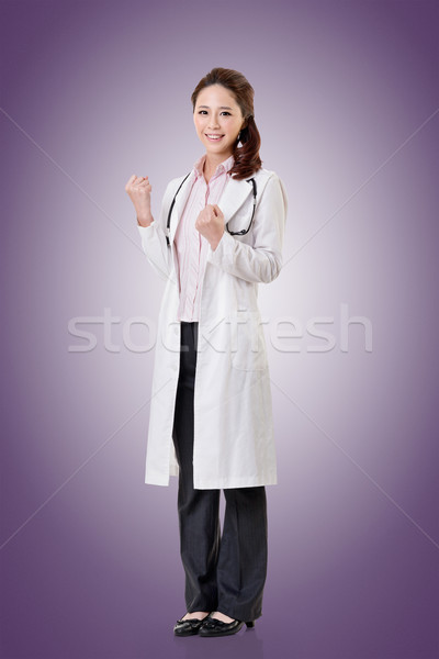 Cheerful Asian doctor Stock photo © elwynn