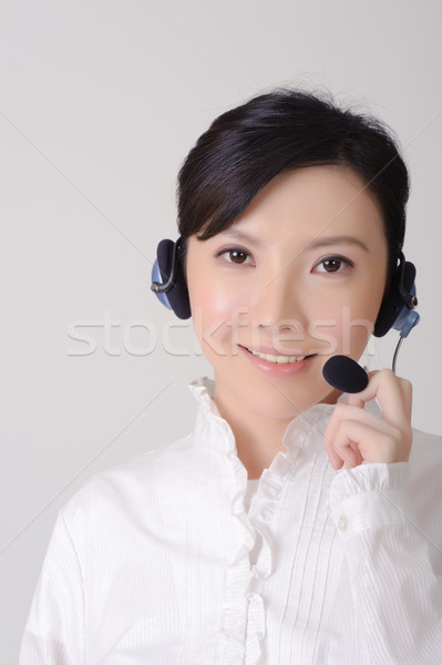 [[stock_photo]]: Asian · assistant · dame · souriant · regarder