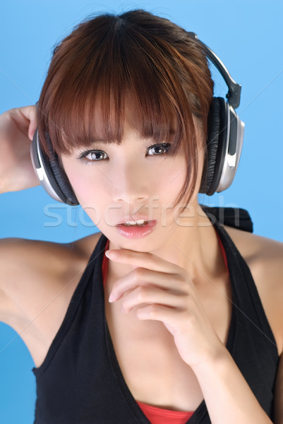 Asian piękna słuchawek niebieski dziewczyna Zdjęcia stock © elwynn