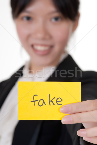 Fake Visitenkarte halten asian Geschäftsfrau Frau Stock foto © elwynn