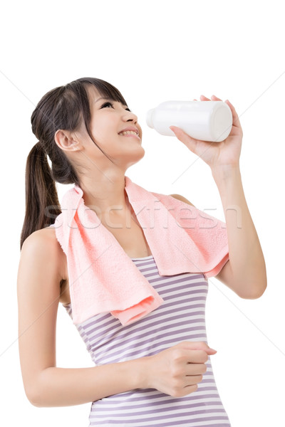 Sportlich asian Frau Trinkwasser Flasche Ausbildung Stock foto © elwynn