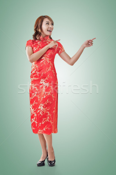 Chinesisch Frau Einführung Kleid traditionellen Neujahr Stock foto © elwynn