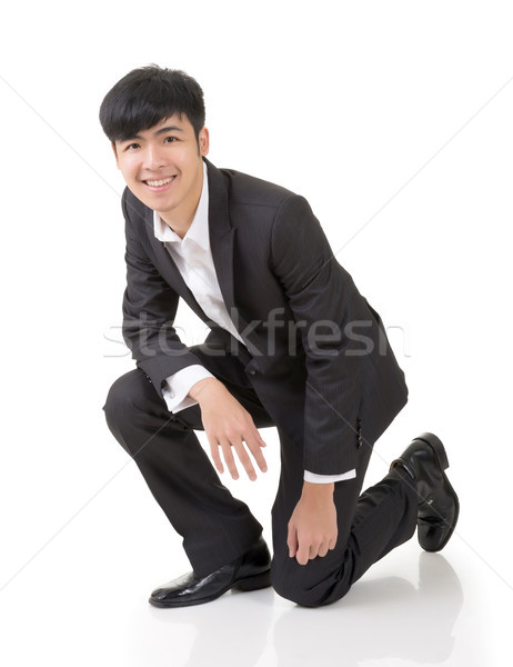 Asian business man squat Stock photo © elwynn