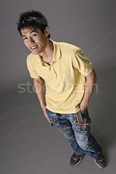 portrait of smiling young man Stock photo © elwynn