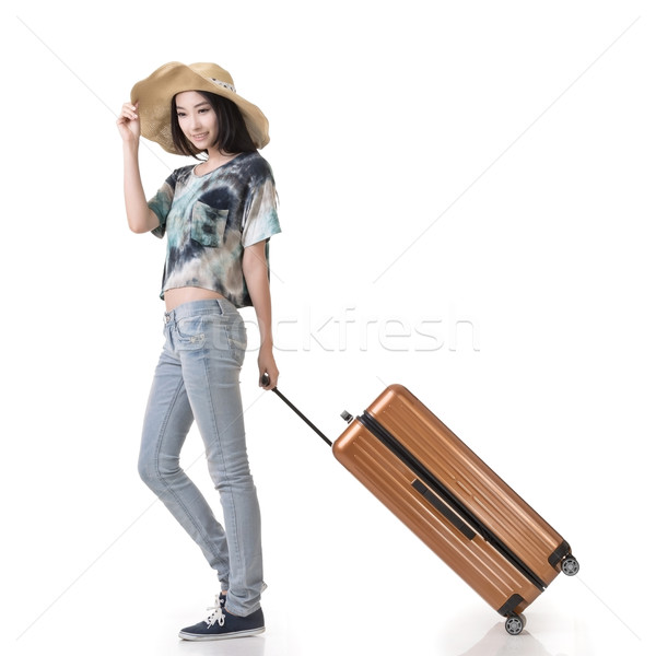 woman drag a luggage Stock photo © elwynn