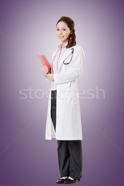 Friendly Asian doctor Stock photo © elwynn