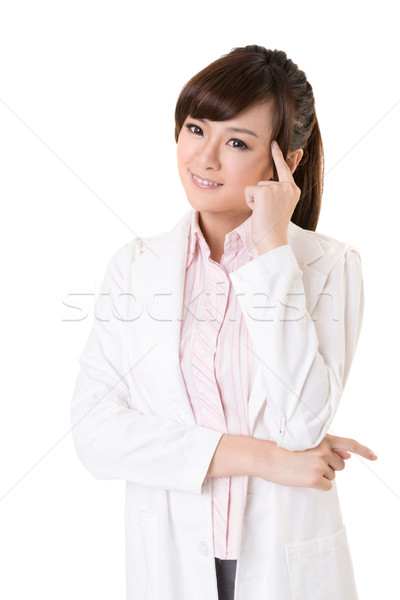 Asian doctor woman thinking Stock photo © elwynn