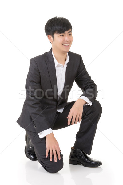 Asian business man squat Stock photo © elwynn