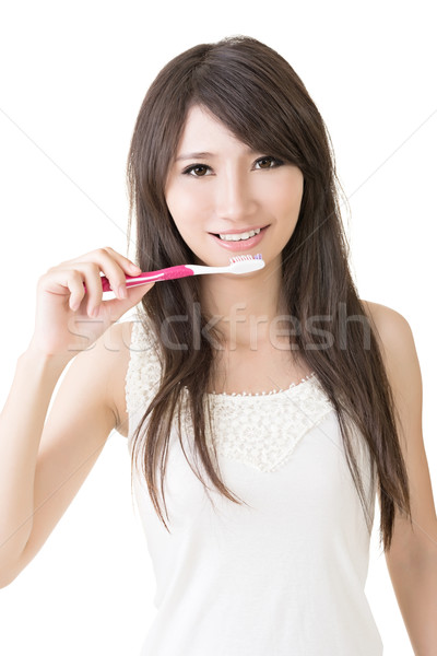 Vonzó ázsiai nő fogmosás fehér boldog Stock fotó © elwynn