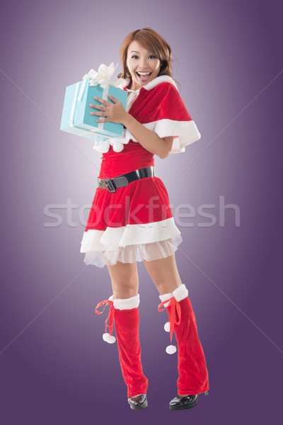 Uśmiech szczęśliwy asian christmas dziewczyna utrzymać Zdjęcia stock © elwynn