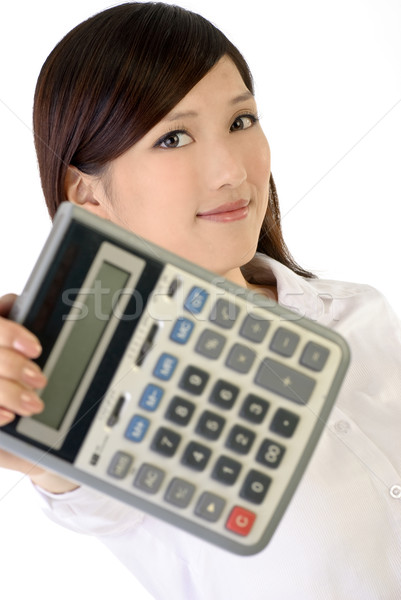 Stock photo: business woman holding calculator