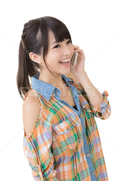 Bastante asiático mulher falante célula jovem Foto stock © elwynn