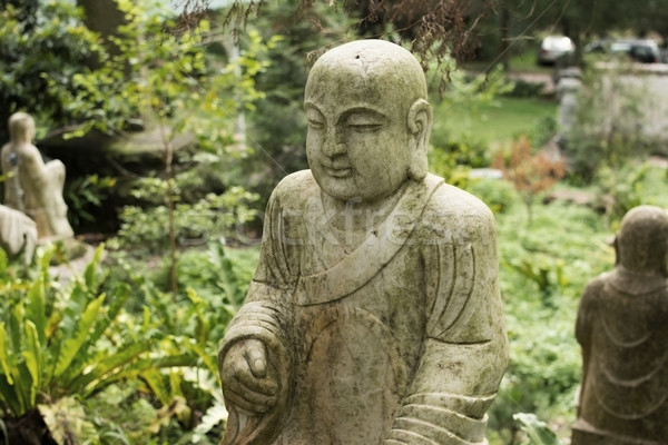 Ruined statue Ksitigarbha Bodhisattva  Stock photo © elwynn