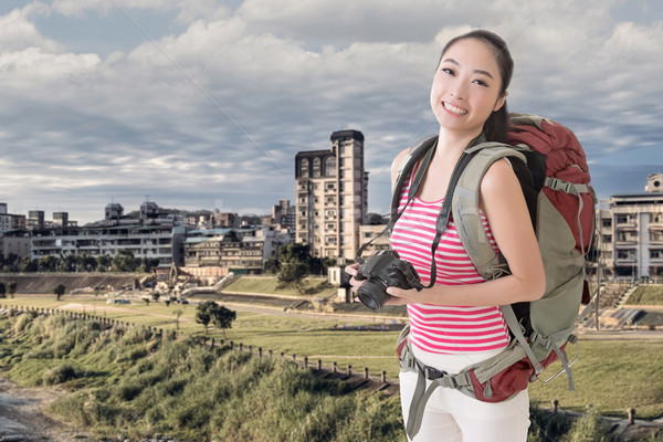 backpacker with camera Stock photo © elwynn