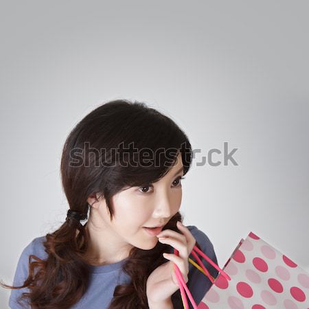 Surprised shopping woman Stock photo © elwynn